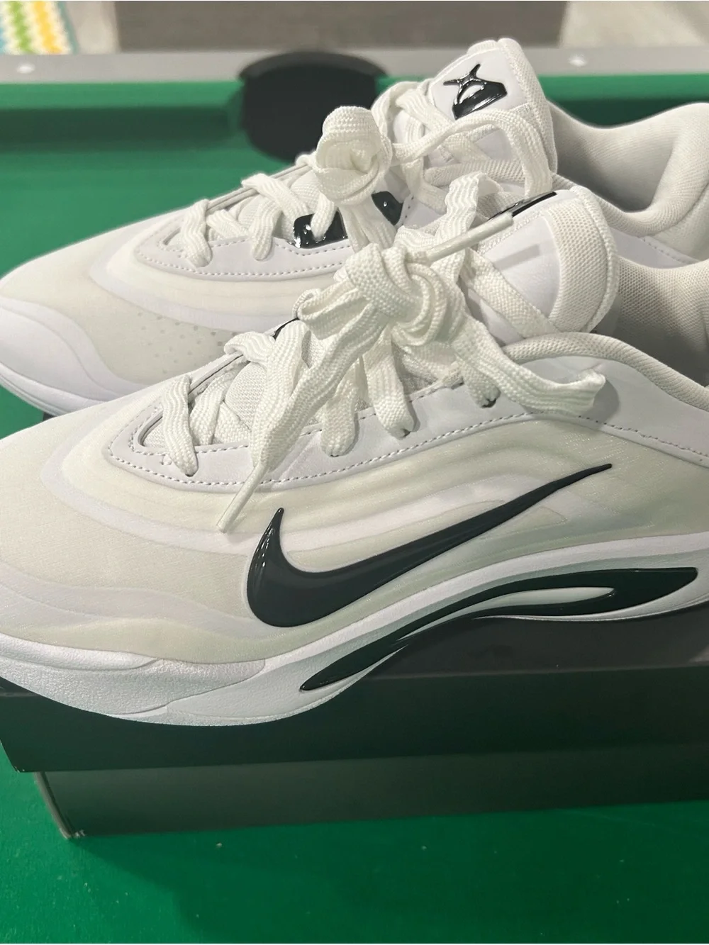 Nike Kids White Sneakers with Black Swoosh Accent